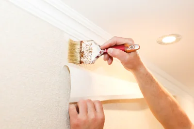 Pose de papier peint aux Loges — revêtements muraux et toiles de verre